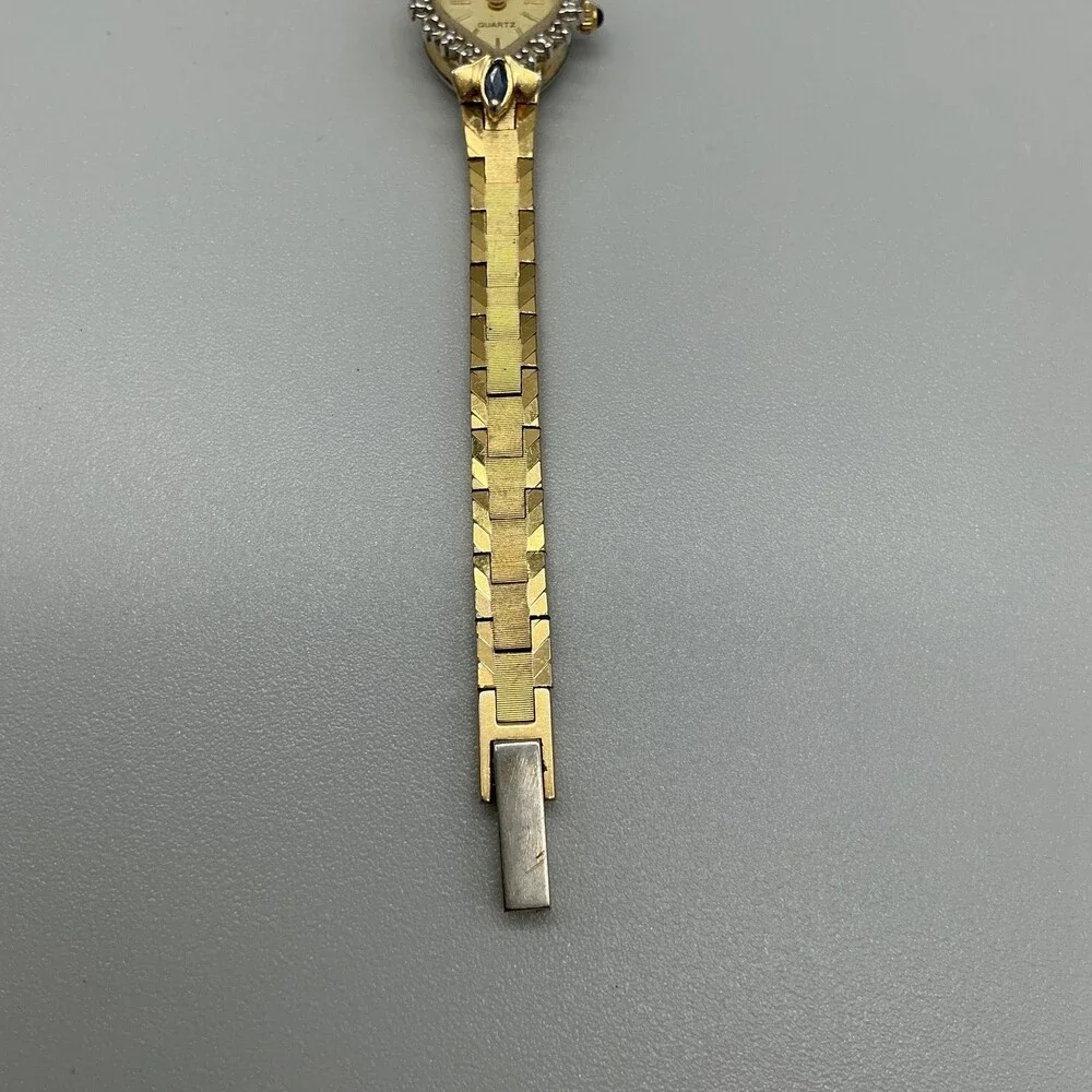 Geneva Womens Watch 16mm Champagne Dial Gold Tone Gemmed Blue Stones FOR PARTS
